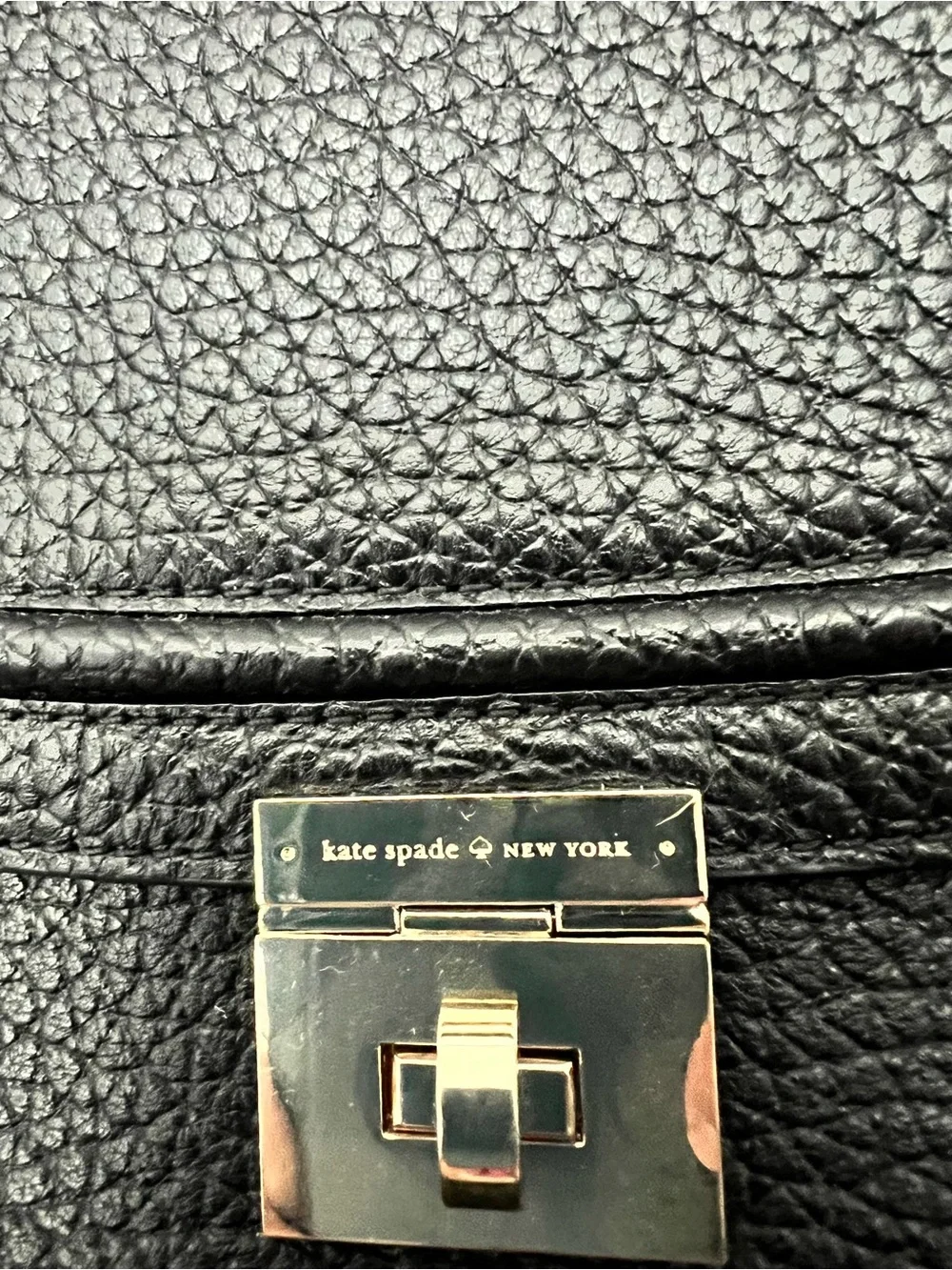 kate spade Black Pebbled Leather Backpack with Gold-Tone Turn Lock